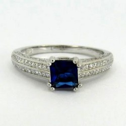 Stříbrný prsten s modrým zirkonem S70-079